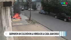 Mattress set on fire on the sidewalk in front of Casa Juan Diego