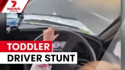 Man charged over viral toddler driving video | 7NEWS